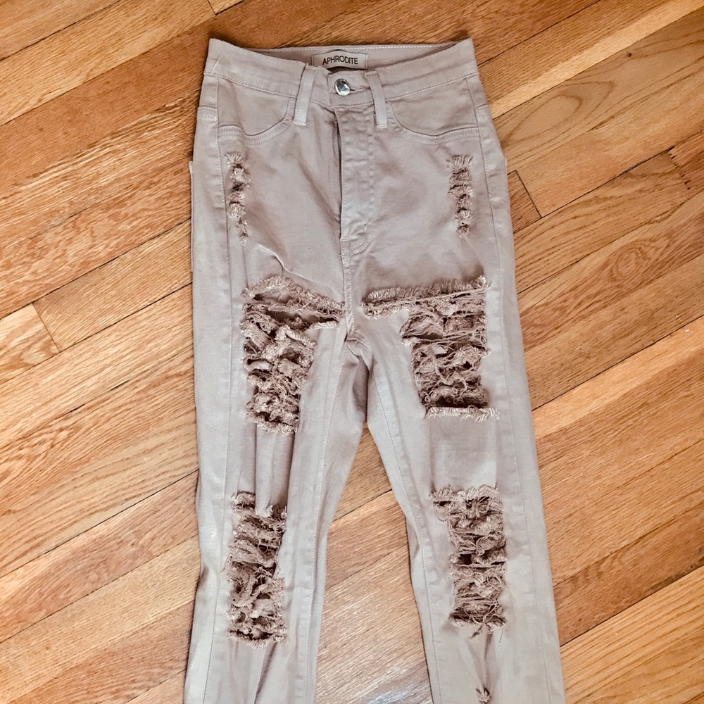 high waisted beige ripped skinny jeans
